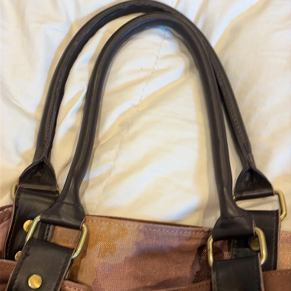 This is the anthropology, deluxe bag, canvas bow floral print